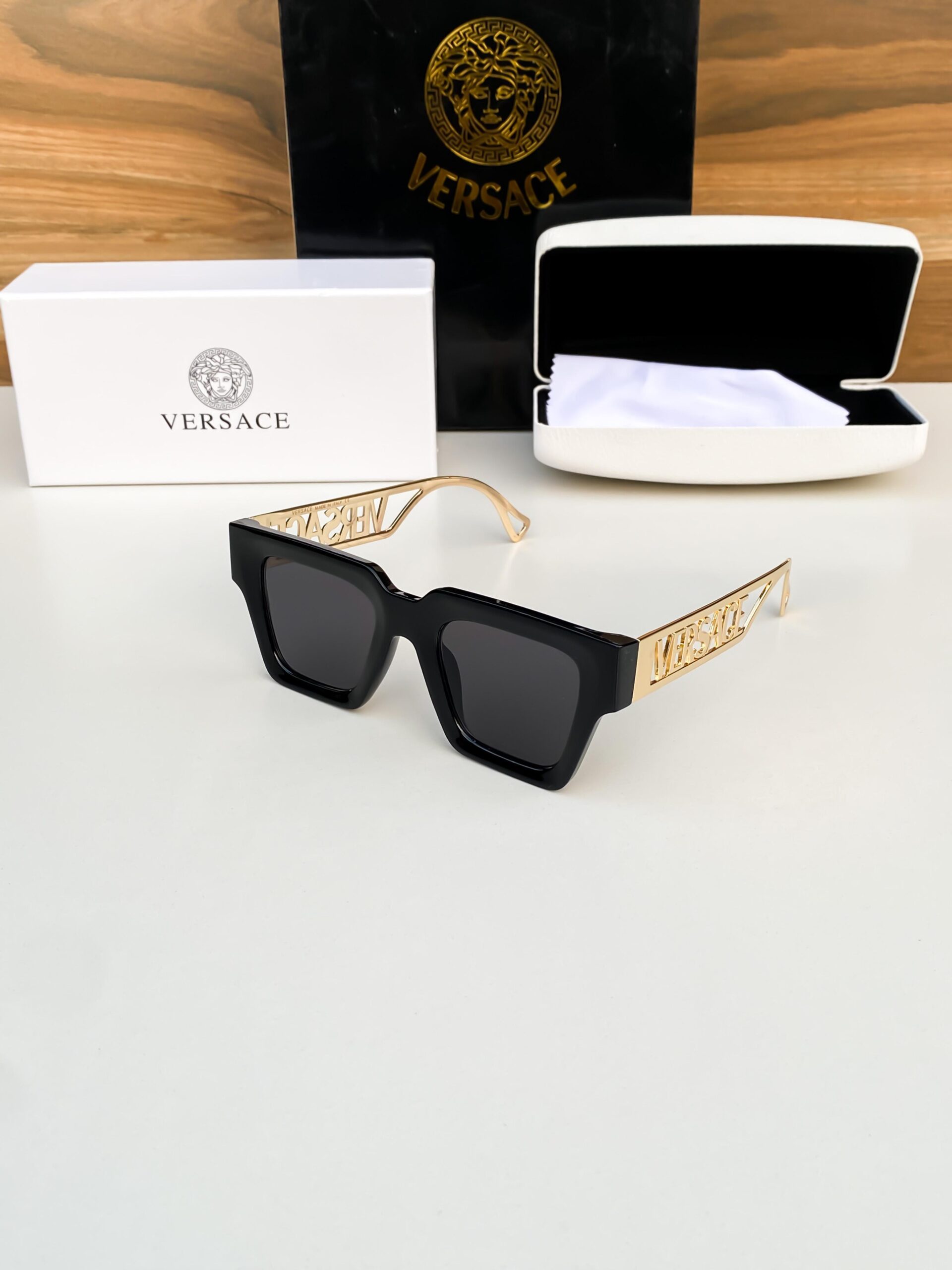 Versace gold black 8800